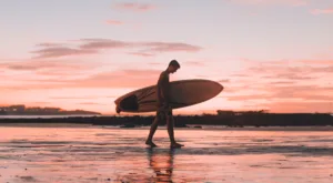 "surfer in sunset"